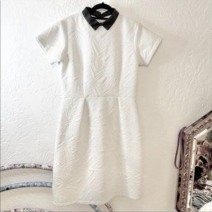 Kingdom & State white quilted dress with black faux leather collar
